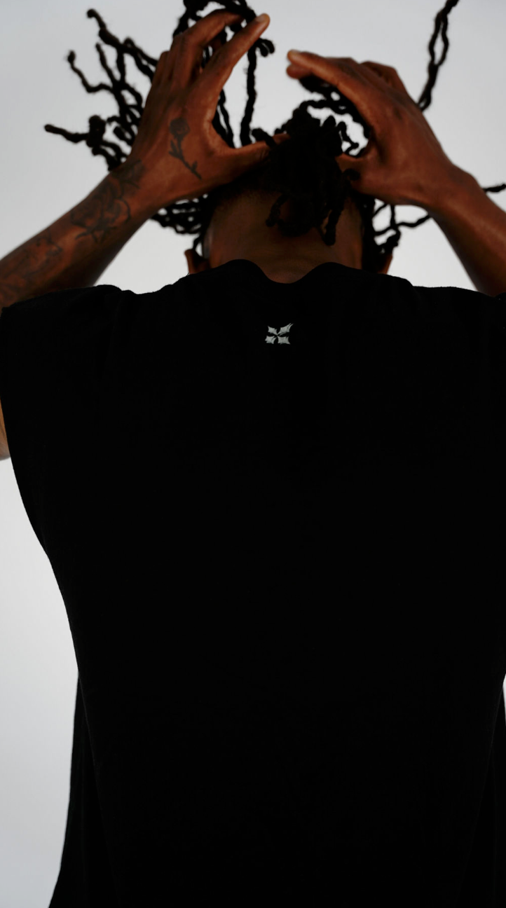 PURE BLACK SLEEVELESS SHIRT.     -F.F.I.D.C